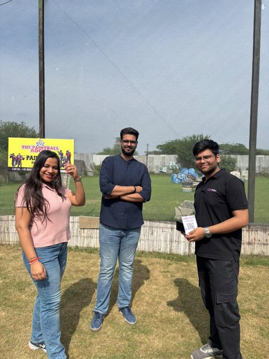RAYY team with venue staff at an outdoor sports ground