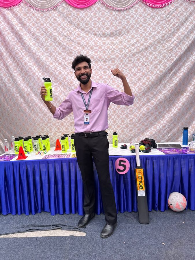 A winner celebrating at the RAYY game stall